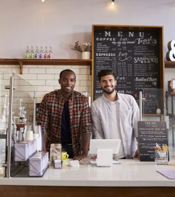 Business Insurance, Two Business Owners at Coffee Shop Counter