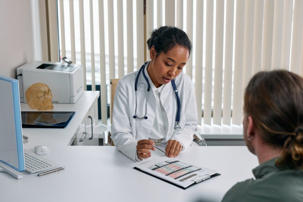 Doctor reviewing the results with a patient in their office